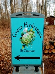 Green hydrangea direction sign