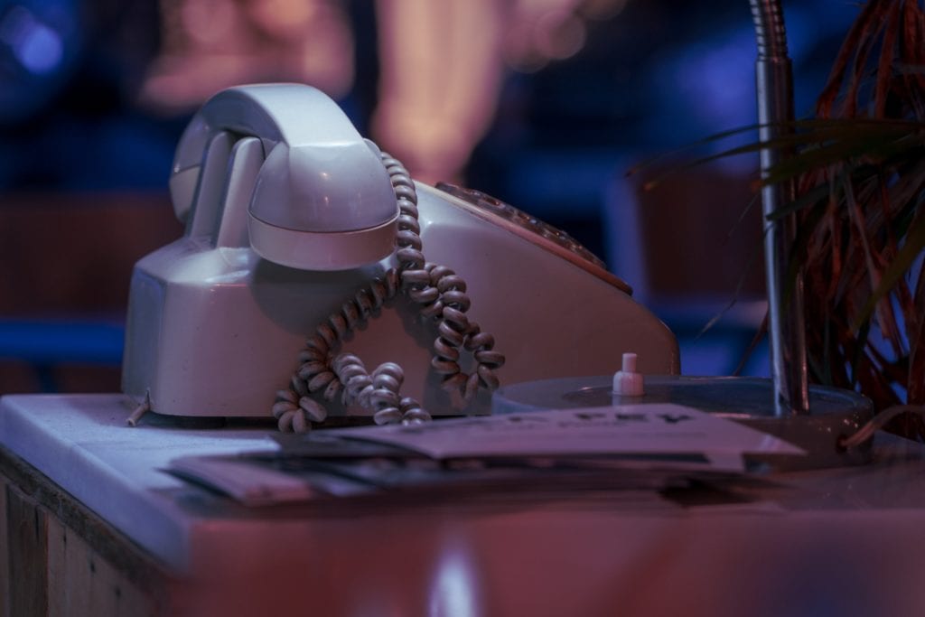 Telephone sitting on desk