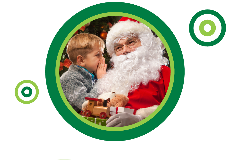 Child talking to Santa Claus